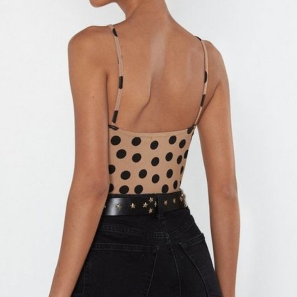 tan and black polka dot bodysuit